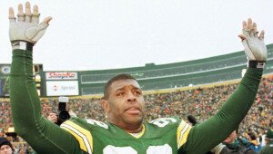GREEN BAY, UNITED STATES: (FILES) Photo dated 04 January 1998 of Reggie White of the Green Bay Packers celebrating after his team's victory over the Tampa Bay Buccaneers in the NFC Divisional playoffs at Lambeau Field, in Green Bay, WI. White, the NFL all-time sack leader, died of a heart attack at his North Carolina home 26 December 2004, one week after his 43rd birthday, according to press reports. AFP PHOTO/FILES/Vincent LAFORET (Photo credit should read VINCENT LAFORET/AFP/Getty Images)